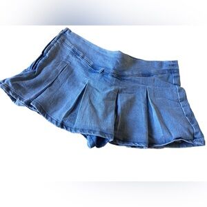Mini blue denim skort.